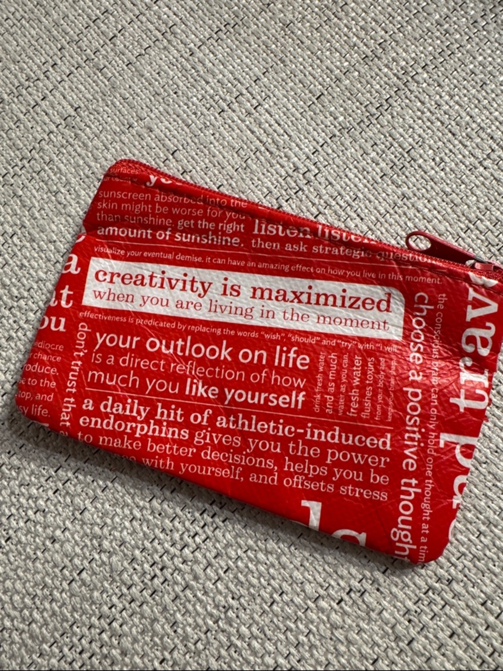 Lululemon Red Text-Print Zip Pouch and matching bag.
